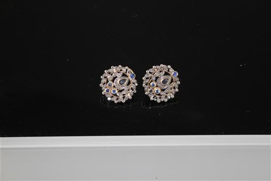 A pair of 20th century Indian style 18k yellow metal and 925 white metal, rose cut diamond and shaped sapphire set foliate earring,